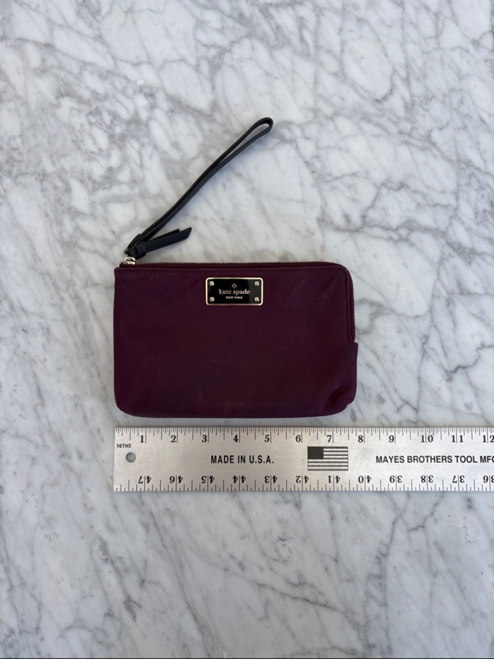kate spade Plum Wristlet with Black Strap and Gold Plate